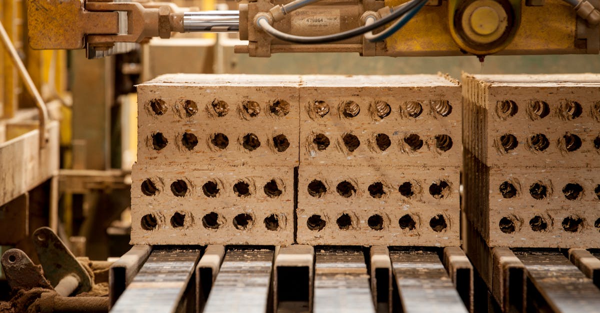 close up of machinery producing bricks in a factory precision and efficiency in industrial manufact